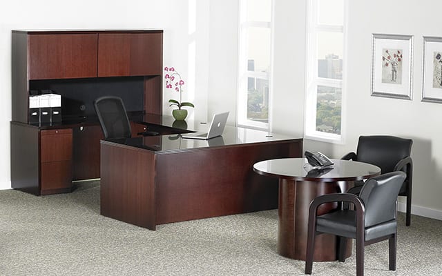 executive desk with seating area