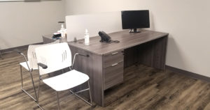 OFW Gray Single Pedestal Desks in Collaborative Setup w/ Added Screen & Guest Chair